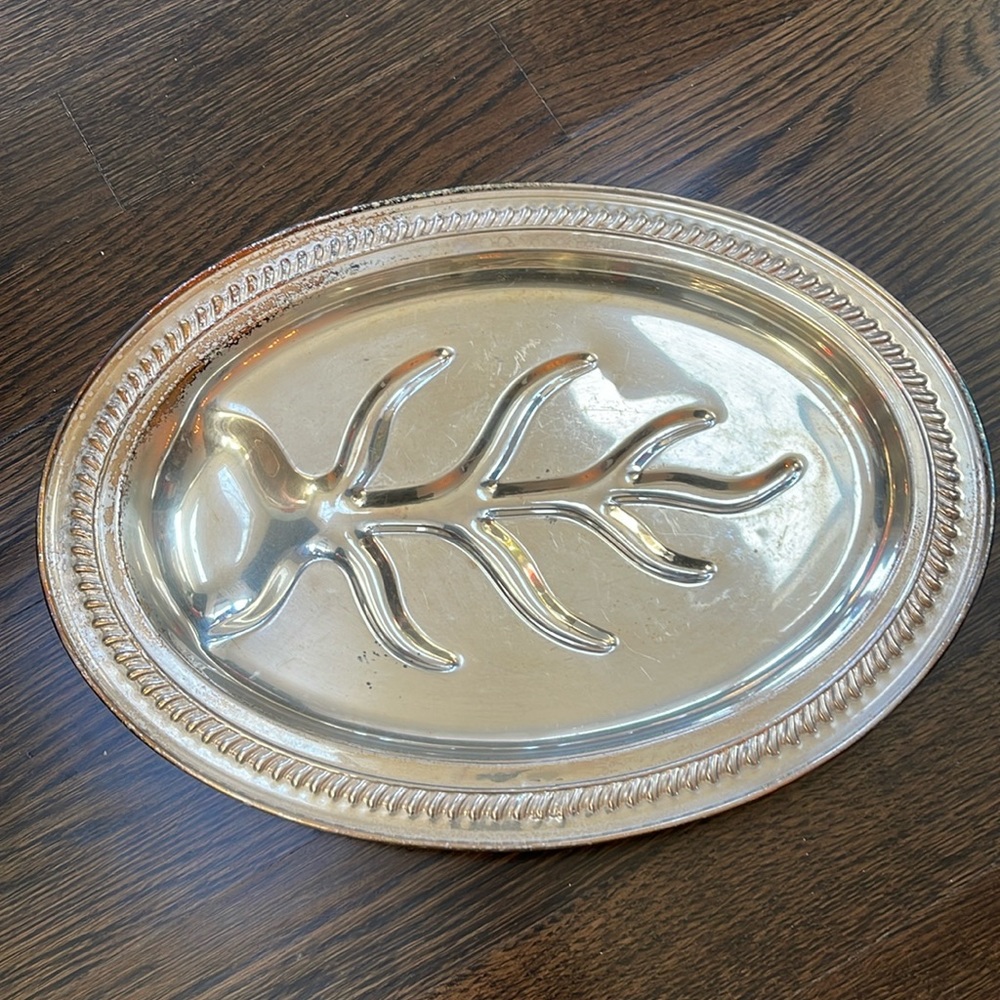 Tree of life vintage oval footed meat juice well serving platter.  Silver plated